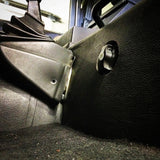 Low Profile Dual Battery Switch Mounted to Land Rover Defender Seat Box